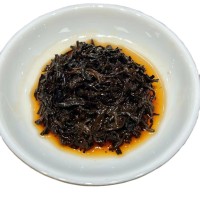 天幸厂家批发直销2022年勐海大树茶普洱熟茶勐海味357g手撕七子饼